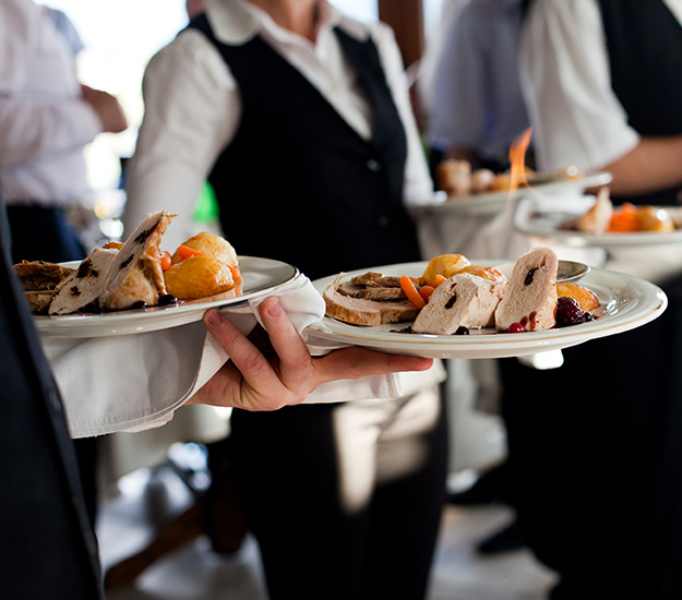Waiters serving food